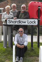 Ivy, Frank Shardalow, John Shardalow and Cliff Shardalow seated